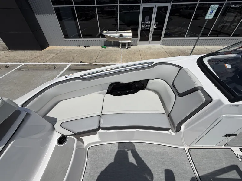 Slide: The Image of Interior of 2024 Yamaha Boats AR250 with gray upholstery. - 28