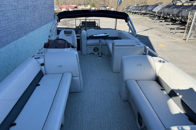 Slide: The Image of Interior of a 2021 Avalon VTX Cruise pontoon boat with seating. - 6