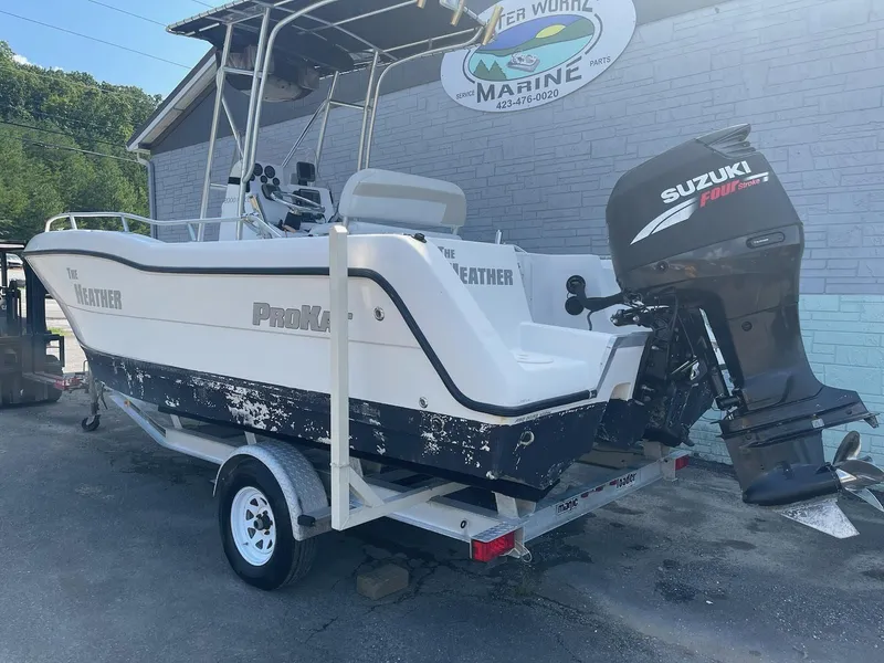 Slide: The Image of 2007 ProKat CS200 boat with Suzuki outboard motor. - 3