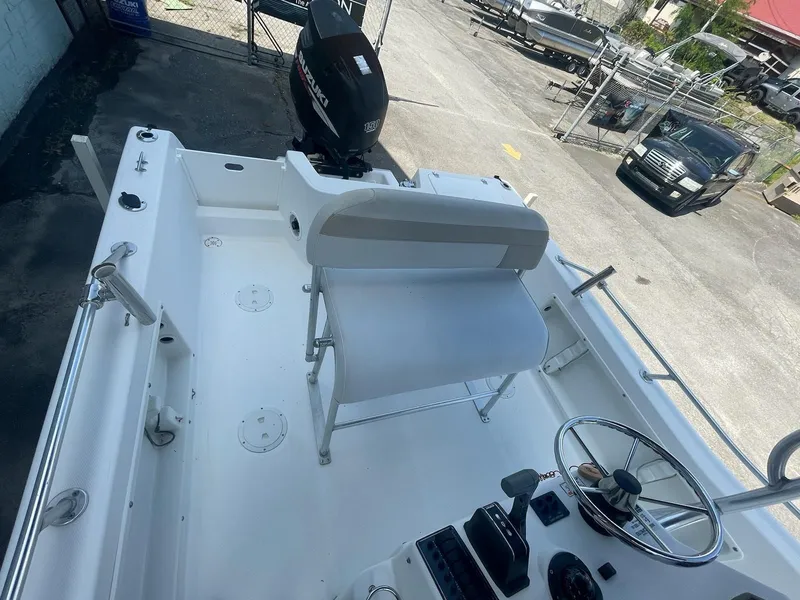 Slide: The Image of Interior view of a 2007 ProKat CS200 boat with helm station. - 5
