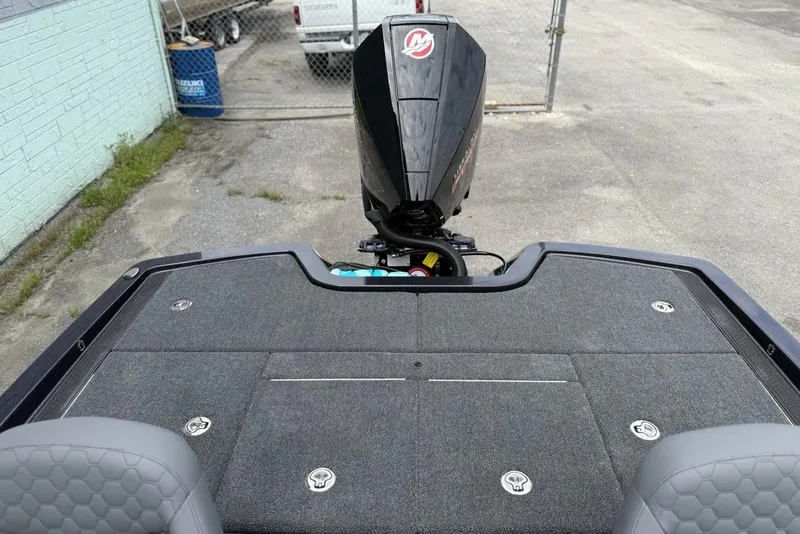 Slide: The Image of iKon vls20 boat with motor, 2026 model, in parking area. - 10