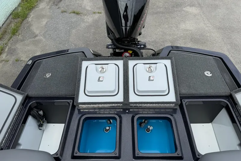 Slide: The Image of iKon vls20 boat rear with storage compartments and motor, year 2026. - 13