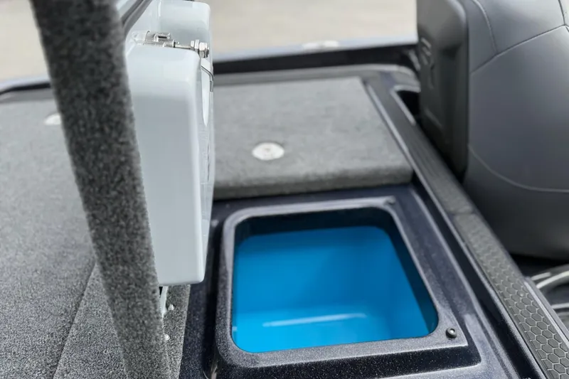 Slide: The Image of iKon vls20 2026 boat with blue storage compartment and grey upholstery. - 14