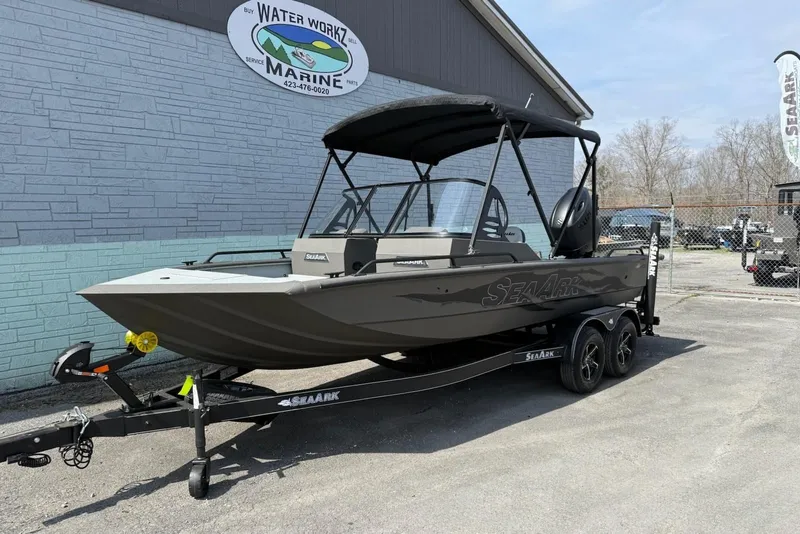 Slide: The Image of 2026 SeaArk Protege 200 boat on trailer at Water Workz Marine. - 2