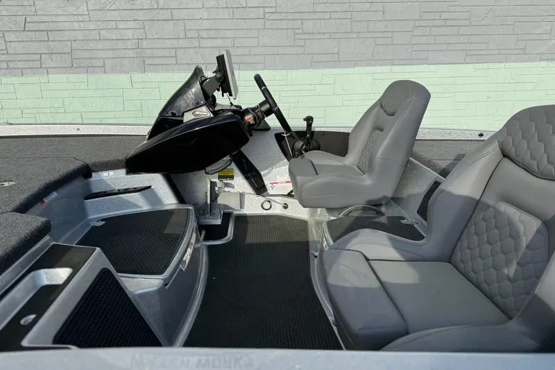 Slide: The Image of Interior of iKon VLX21 boat, 2026 model, featuring gray seats. - 6