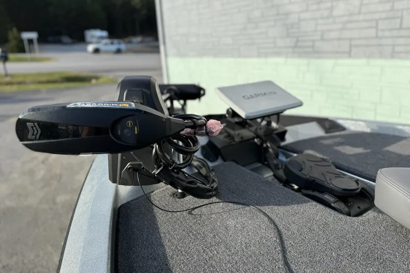 Slide: The Image of iKon VLX21 2026 with Garmin technology on gray boat. - 8