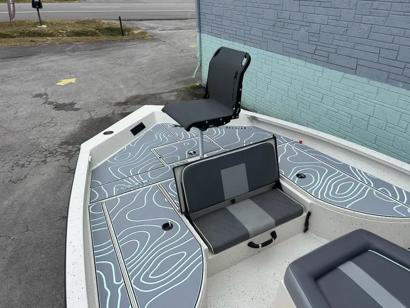 Slide: The Image of 2025 Xpress X23 Bay Lounge boat with stylish seating design. - 5
