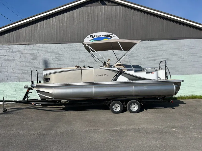 The Image of 2025 Avalon 2385 LSZ Rear Lounger pontoon boat on trailer. - 1
