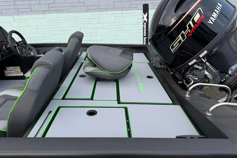 Slide: The Image of Interior of a 2026 Xpress H18 boat with Yamaha engine. - 5