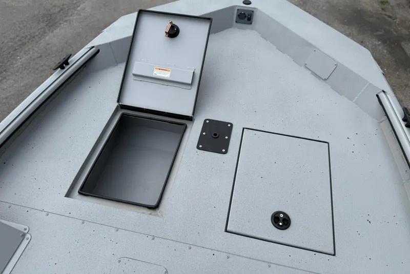 Slide: The Image of SeaArk Shadow 18 boat deck with storage, model 2026. - 8
