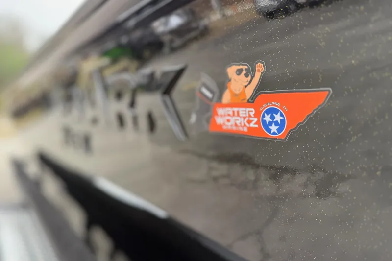 Slide: The Image of Close-up of SeaArk Flex 21 Pro boat sticker, model year 2026. - 6