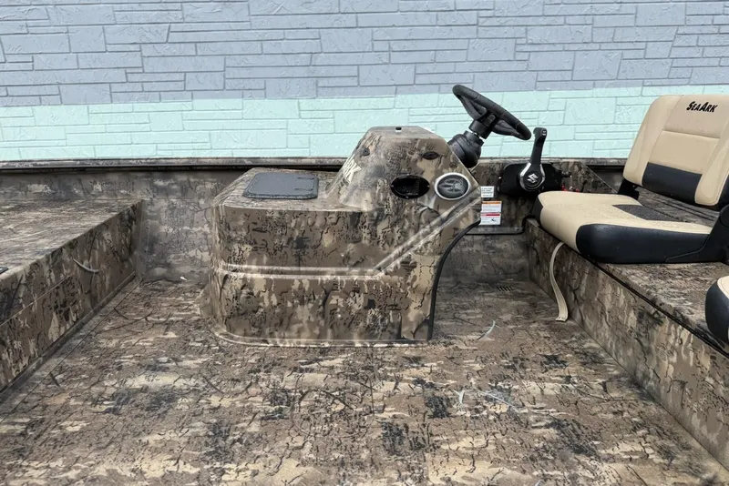 Slide: The Image of Interior of 2026 SeaArk Phantom 20XV with camouflage design. - 8