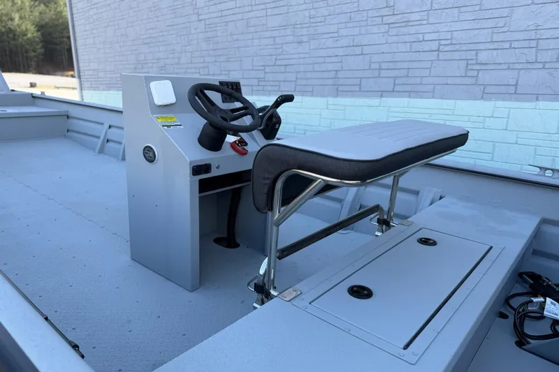 Slide: The Image of Interior view of SeaArk 2472 Workhorse boat, model year 2026. - 7
