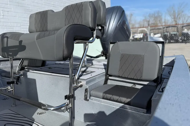 Slide: The Image of 2026 Xpress H20B Bay boat with modern seating. - 7
