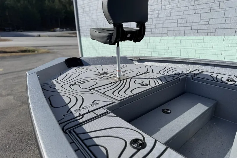 Slide: The Image of 2026 Xpress H20B Bay boat featuring modern design and seating. - 8