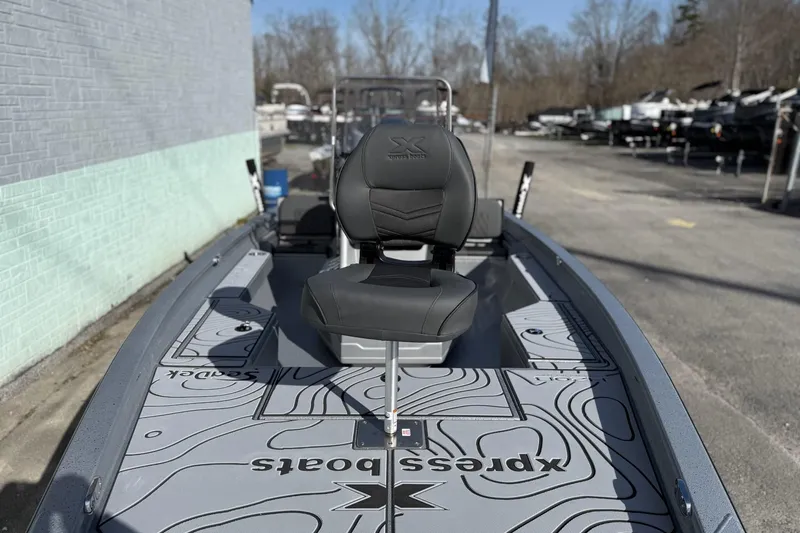 Slide: The Image of 2026 Xpress H20B Bay boat with sleek design and seating. - 9