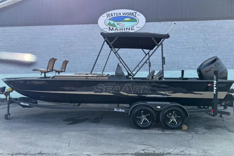 The Image of SeaArk Big Easy 2026 boat parked outside marine shop. - 1