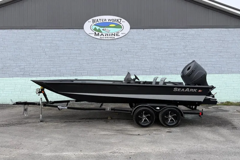 The Image of 2026 SeaArk Shadow 20 boat in front of marine shop. - 1