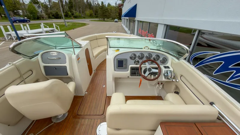 Slide: The Image of Interior of a 2006 Chris-Craft Launch 28 boat with wooden flooring. - 22