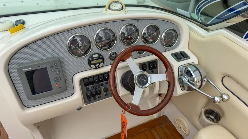 Slide: The Image of Dashboard of a 2006 Chris-Craft Launch 28 boat. - 23
