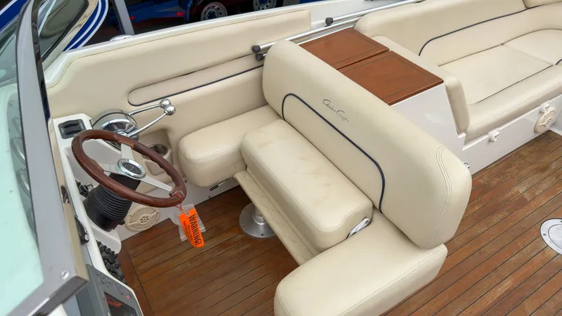 Slide: The Image of Interior of a 2006 Chris-Craft Launch 28 with leather seating. - 25