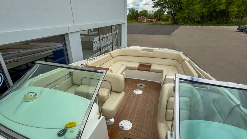 Slide: The Image of Interior view of a 2006 Chris-Craft Launch 28 boat with wooden flooring. - 27