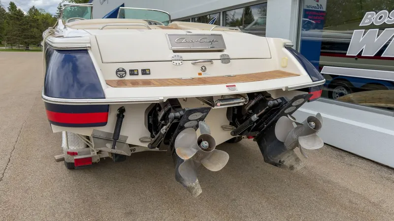 Slide: The Image of Rear view of a 2006 Chris-Craft Launch 28 boat with dual engines. - 4