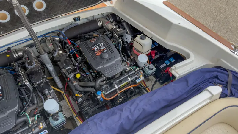 Slide: The Image of Engine compartment of a 2006 Chris-Craft Launch 28 boat with Mercury engine. - 8