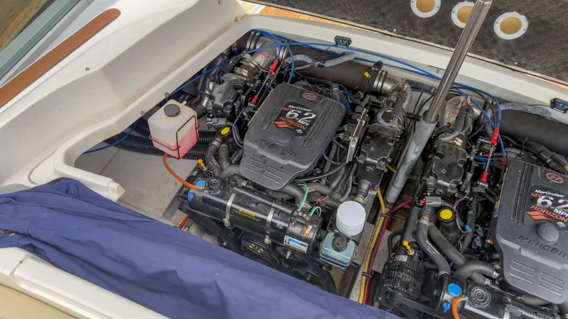 Slide: The Image of Engine compartment of a 2006 Chris-Craft Launch 28 with MerCruiser engines. - 9