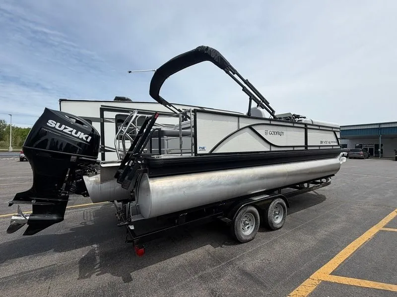 The Image of 2024 Godfrey Pontoons 2286 SFL with Suzuki engine on trailer. - 1