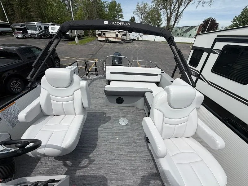 Slide: The Image of 2024 Godfrey Pontoons 2286 SFL with luxurious white seating. - 5