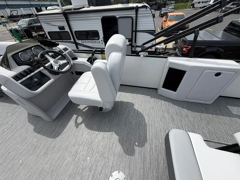 Slide: The Image of Interior of a 2024 Godfrey Pontoons 2286 SFL with helm console. - 7