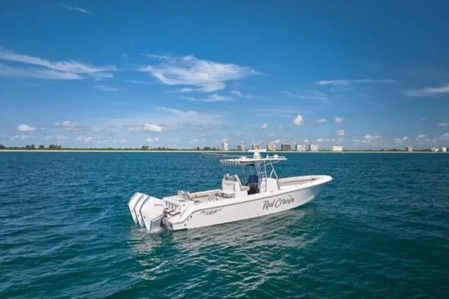 Slide: The Image of Bluewater 355e 2022 boat on open sea with clear blue sky. - 10