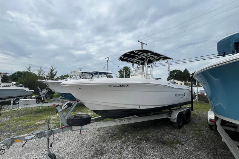 Slide: The Image of 2020 Robalo R200 Center Console boat on trailer in outdoor lot. - 1