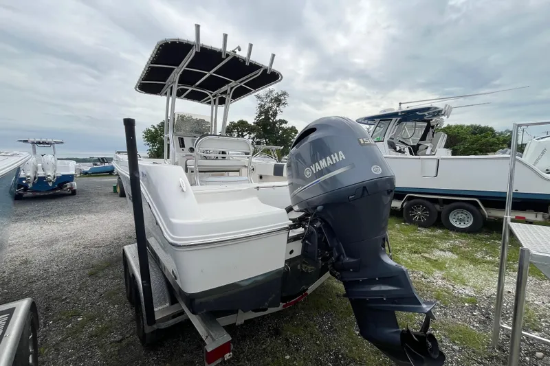 Slide: The Image of 2020 Robalo R200 Center Console boat with Yamaha engine on trailer. - 2