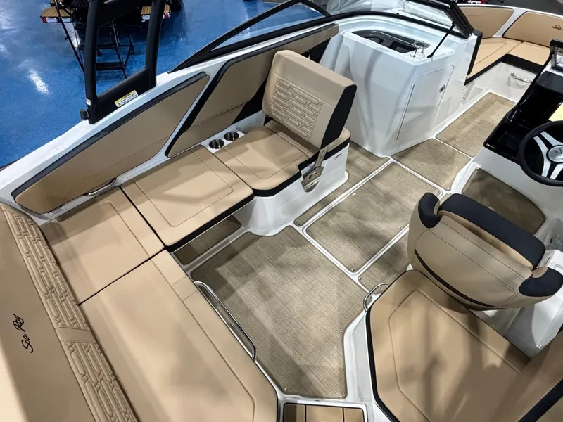 Slide: The Image of Interior of 2026 Sea Ray SPX 210 boat with beige seating. - 14