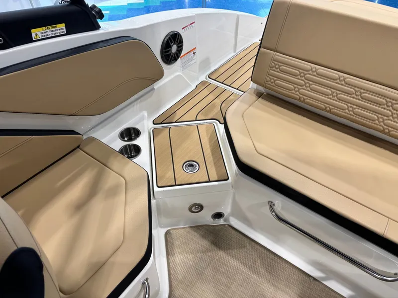 Slide: The Image of Interior of 2026 Sea Ray SPX 210 boat with beige seating. - 22