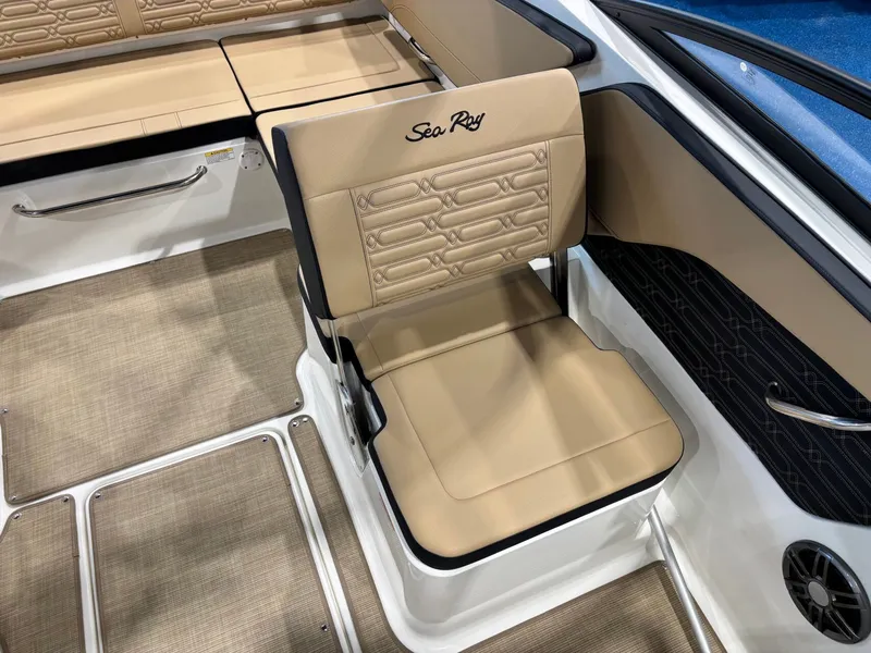 Slide: The Image of Interior of Sea Ray SPX 210 boat, beige upholstery, model year 2026. - 23