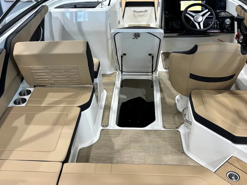Slide: The Image of Interior of 2026 Sea Ray SPX 210 boat with beige seating. - 28