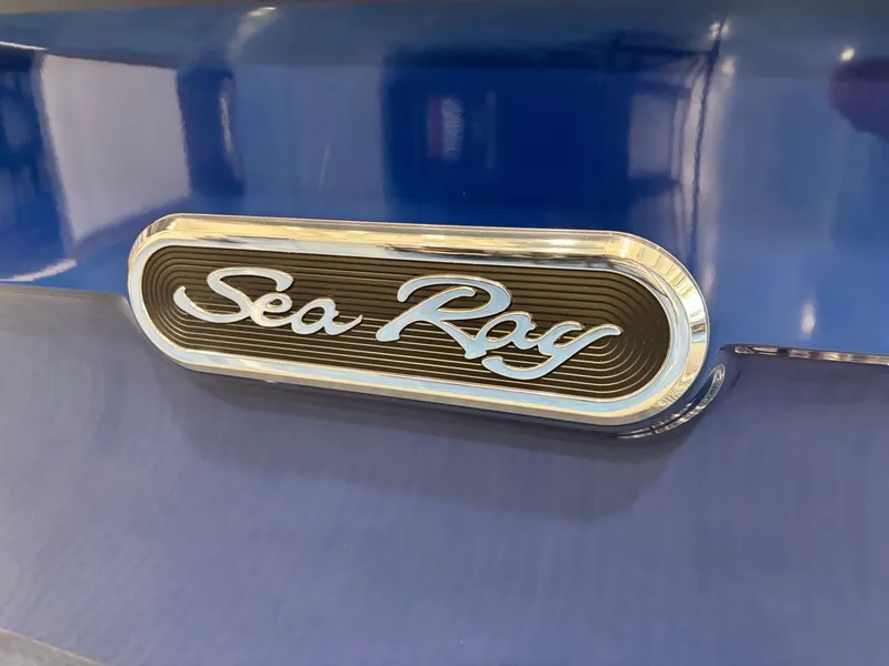 Slide: The Image of Sea Ray SPX 210 2026 logo on blue background. - 40