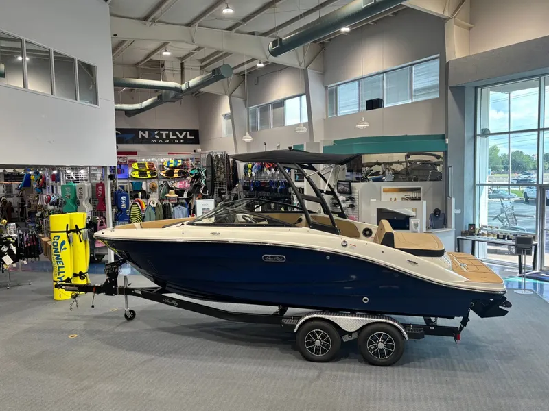 Slide: The Image of 2026 Sea Ray SPX 210 boat in showroom. - 5