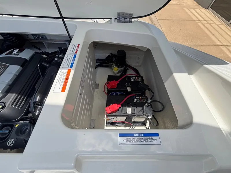 Slide: The Image of Battery compartment of Sea Ray SPX 210 boat, year 2026. - 22