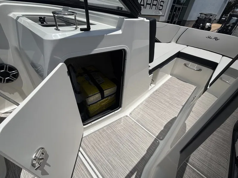 Slide: The Image of Interior of 2026 Sea Ray SPX 210 with storage compartment. - 27