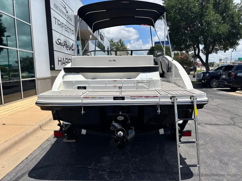 Slide: The Image of Rear view of a 2026 Sea Ray SPX 210 boat with ladder. - 8