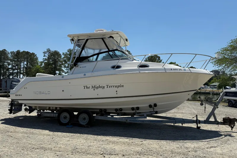 The Image of 2007 Robalo R305 Walkaround boat named "The Mighty Terrapin" on a trailer. - 0