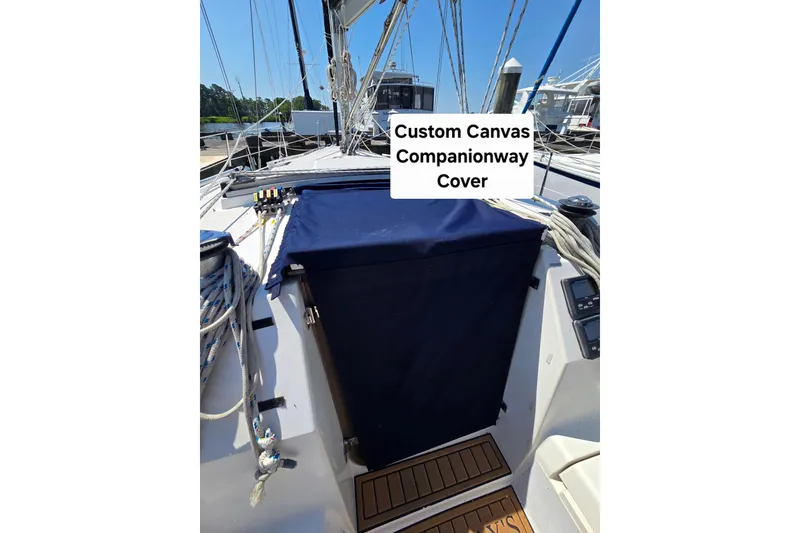 Slide: The Image of Hunter Legend 35.5 sailboat with custom canvas companionway cover, 1993 model. - 11