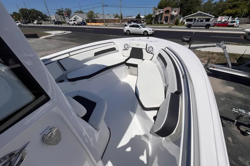 Slide: The Image of 2026 Tidewater 220 CC Adventure boat interior with sleek seating and modern design. - 10
