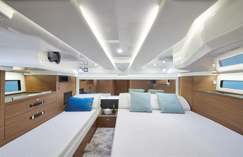 Slide: The Image of 2024 Jeanneau Leader 12.5 WA cabin interior with modern design and comfortable bedding. - 18