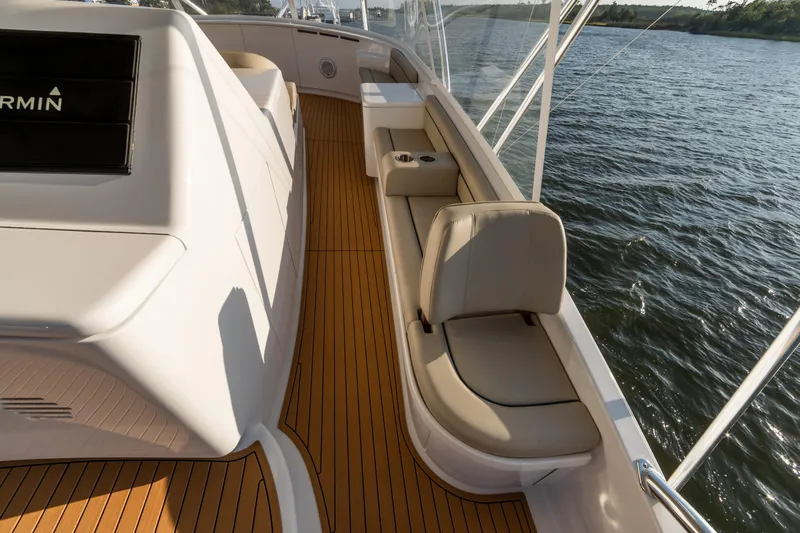 Slide: The Image of Luxurious 2020 Jarrett Bay 84 yacht deck with comfortable seating and scenic water view. - 34