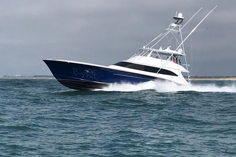 Slide: The Image of 2020 Jarrett Bay 84 yacht cruising on open water. - 5